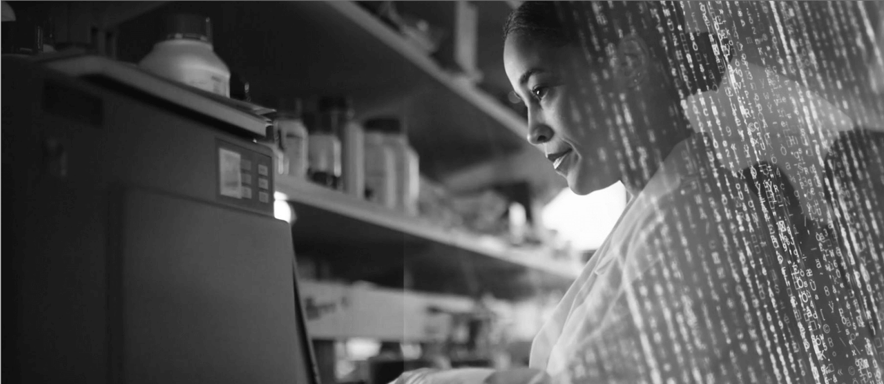 Female scientist in lab with data stream overlaid